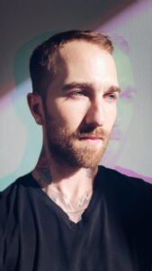 Chris Bennett, The Tarot Medium, evidential medium and tarot reader, in a contemplative portrait