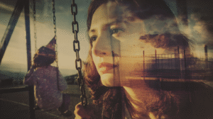 grief-inner-child-tarot-transformation-path double exposure photography woman facing her inner child