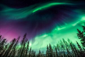 The northern lights over dark sky, often called the Earth's own aura