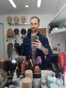 Chris Bennett working as hair department head for Universal Pictures before tarot became the calling