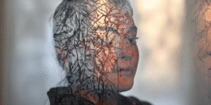 Double exposure of a shadowed silhouette, family bonds strained by survival mode and unspoken distance