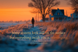 Woman standing alone in a frozen field at dusk, breath visible, symbolizing feeling stuck in life, emotional burnout and quiet longing for direction.