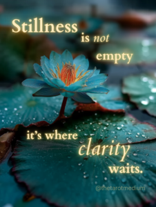 A blue lotus flower in calm water with the quote “Stillness is not empty. It’s where clarity waits.”