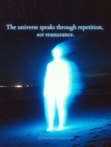 A glowing human silhouette on a dark beach with the quote “The universe speaks through repetition, not reassurance.”