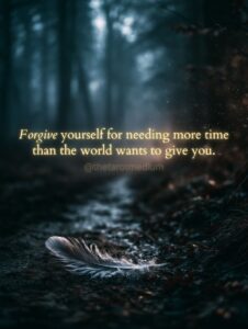 A single white feather resting on a foggy forest path with the quote "Forgive yourself for needing more time than the world wants to give you." From The Tarot Medium on whether it's normal to keep everything after someone dies.